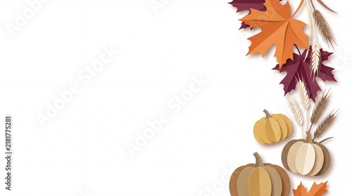 A beautiful thanksgiving holiday background featuring a vertical border of colorful autumn leaves and small pumpkins on a clean white surface with plenty of space