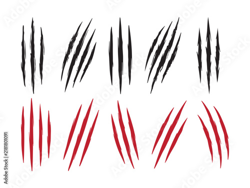 Set of black and red animal claw scratch marks isolated on a white background for design elements