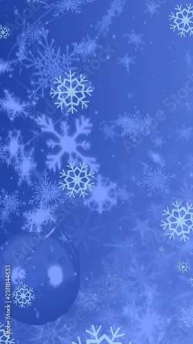 This video is a digital animation of blue snowflakes falling against a black background