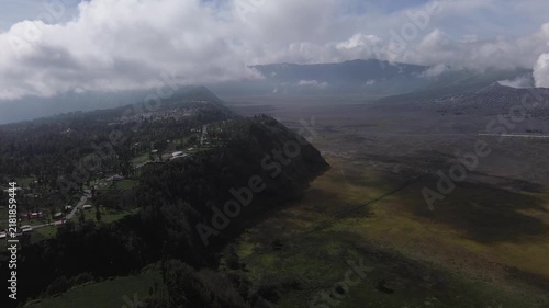 Majestic aerial view of the active mount bromo volcano and the village of cemoro lawang in indonesia