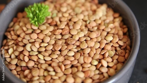 Green lentils raw grains appetizer food preparation vegetable dish tasty snack fresh gourmet rustic food background on the table  rustic food top view copy space keto and paleo diets vegetarian and ve