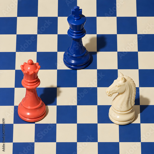 Colorful chess pieces on board for strategy and competition