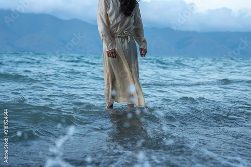 Fotografía Jesus walks on water, divine miracle, biblical scene.