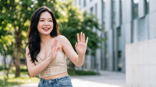 Quadro su tela Woman Showing Stop Hand Gesture on Urban Walkway