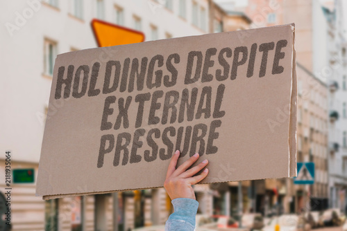 Bild auf Leinwand "holdings despite external pressure" Long-term commitment to holdings despite external pressure and doubt