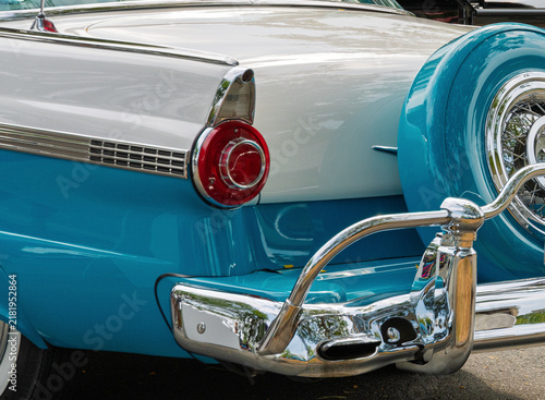 Bild auf Leinwand Close-up of a classic  vintage car with shiny chrome details and headlight