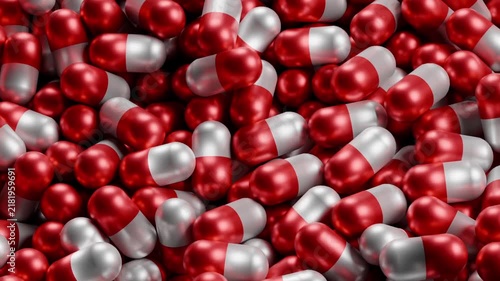Red and white capsules dominate the frame. Glossy surfaces reflect light. Capsules are evenly clustered. Each pill has distinct halves. No people or animals present
