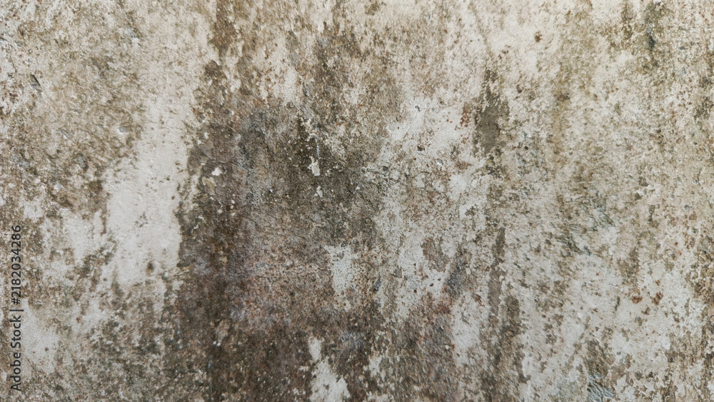 Fototapeta premium Aged concrete wall texture with peeling paint and weathered surface.