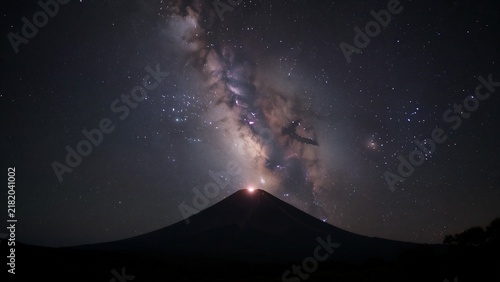 Galactic Core Rising Over a Silhouetted Volcanic Peak