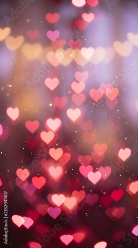 Floating Pink and Red Glowing Heart Bokeh Lights Romantic Background