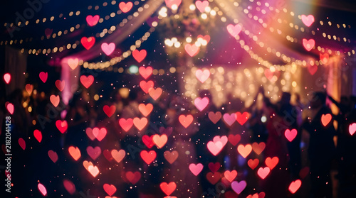 Floating Pink and Red Glowing Heart Bokeh Lights Romantic Background