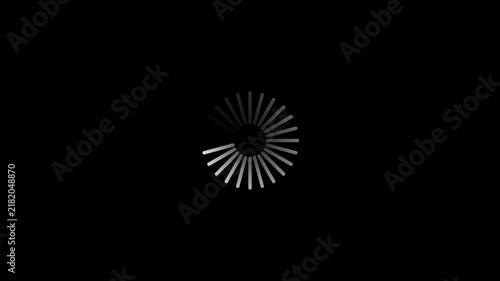 A white circular loading spinner with radiating spokes against a solid black background indicating a process in progress or waiting state for digital interfaces and applications