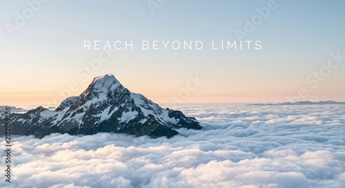 Majestic Snowy Mountain Peak Above Clouds in Vast Sky