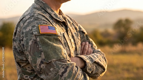 A proud american soldier standing in a field during sunset for a meaningful veteran day tribute portrait