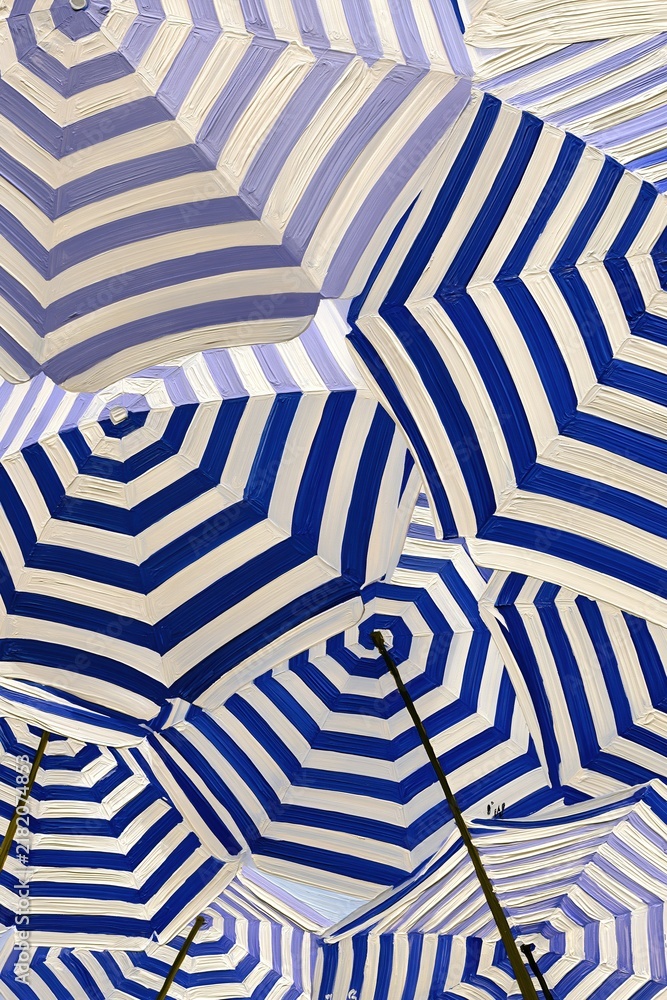 Obraz premium Vibrant Blue and White Striped Beach Umbrellas Create a Cheerful Overhead Canopy on a Sunny Day