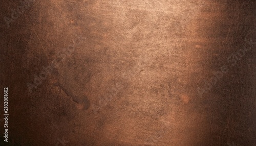 Fotografía Bronze copper plate and steel metal sheet texture on a dark black brown surface,