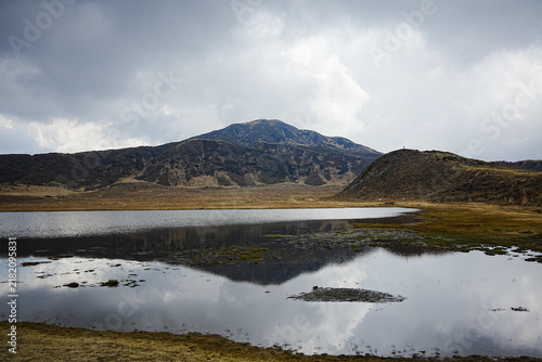 Mountain Reflected in Pond at Kusasenri Grassland in Aso, Kumamoto, Japan