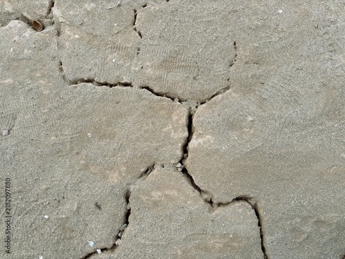 Obraz na plátne The ground surface, parched and cracked due to the prolonged dry season