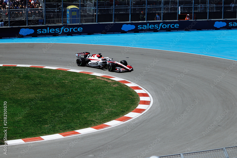 Obraz premium May 24, 2026, Montreal, Canada, Esteban Ocon races a Haas F1 car at Circuit Gilles-Villeneuve. g.