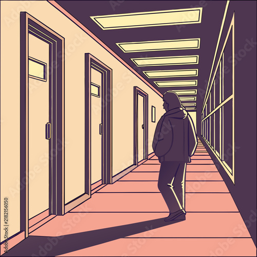 Person walking down a long quiet office hallway with multiple doors at sunset light