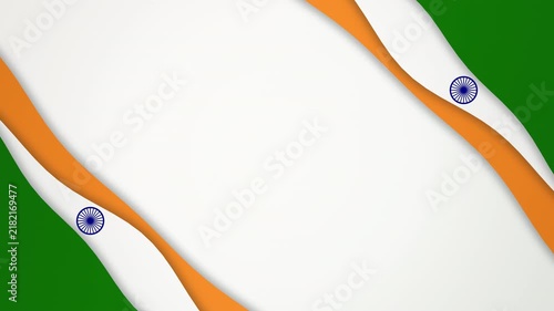 Patriotic abstract background inspired by the India flag: flowing ribbon paper cut layers with saffron, white and green stripes and a navy blue rotating Ashoka Chakra wheel that stays locked onto the 