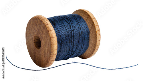 Bild auf Leinwand Wooden spool with dark blue thread, isolated on transparent background