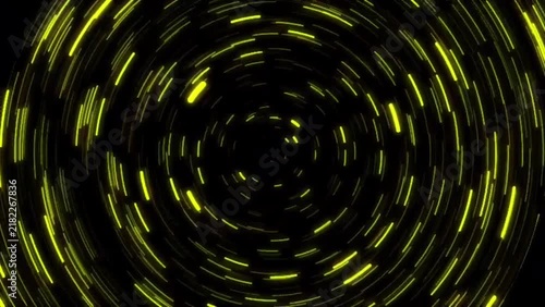 A seamless looping background featuring abstract, glowing yellow particles swirling in a circular motion