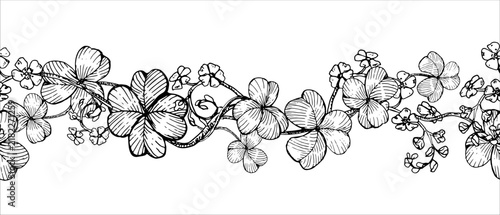 Seamless clover and forget-me-not flowers border hand drawn vector ink sketch. Illustration for greeting cards, Irish branding, celtic festival decor and rustic wedding invitation luxury frames.