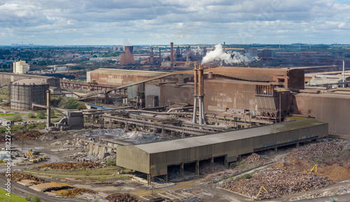 Scunthorpe Steelworks in North Lincolnshire, England, showing blast furnaces, chimneys and extensive infrastructure used for iron and steel production.