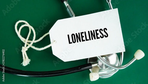 Canvas Print Stethoscope and paper tag with the word Loneliness
