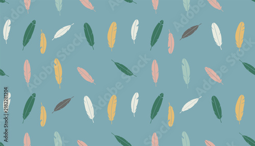 Seamless background pattern containing a variety of colorful bird feathers scattered over a serene blue gray background.