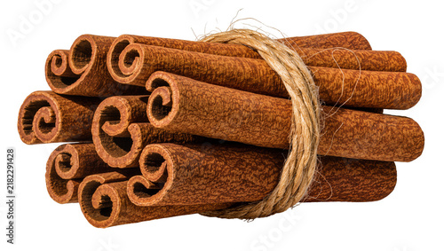 Cuadro en lienzo Bundle of dried cinnamon sticks tied with rough jute twine, isolated on transpar