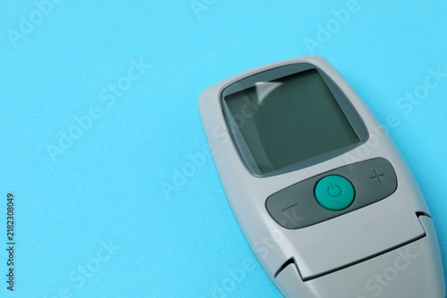 Konstfotografi Blood glucose meter with lancets, top view