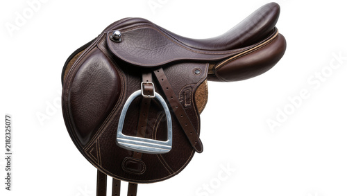 Obraz na plátně Brown leather equestrian saddle with metal stirrup, isolated on transparent back