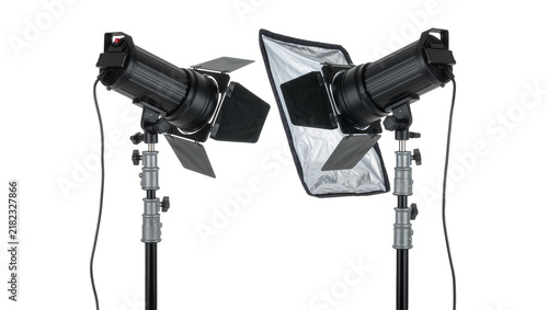 Two black professional studio spotlights with barn doors and softbox, isolated on transparent background