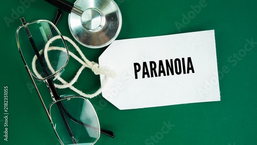 Fotografie Stethoscope and paper tag with the word Paranoia