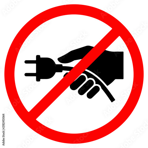 A red circular prohibition sign featuring a black hand holding an electrical plug, indicating no plugging in, isolated on a white background