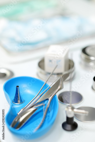 ENT instruments lie in the tray in the doctor's office of clinic. Steel medical instruments used during an otolaryngologist examination.