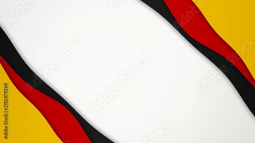 Patriotic abstract background inspired by the Germany flag: flowing ribbon paper cut layers with black, red and gold stripes arranged as two diagonal clusters in the top right and bottom left corners 