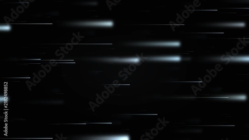 Bright light streaks move rapidly across a dark void to create a sense of futuristic hyperspace travel.