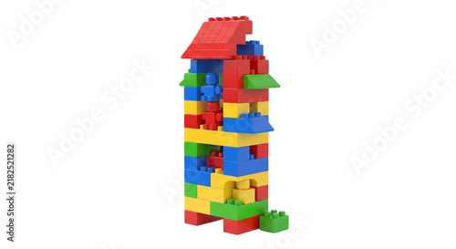 Tall, colorful building block creation reaching upwards, symbolizing childhood creativity, engineering, and imaginative play on a white background