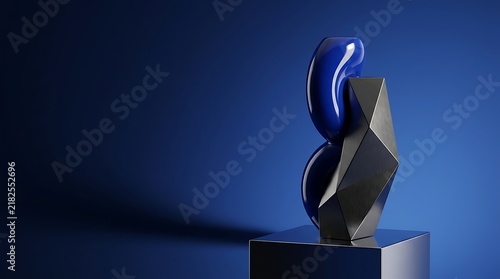 Abstract modern sculpture featuring smooth blue glass elements combined with textured dark stone on a pedestal