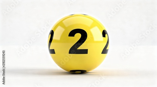 A shiny yellow lottery ball with the number 2 prominently displayed on it against a plain white background.