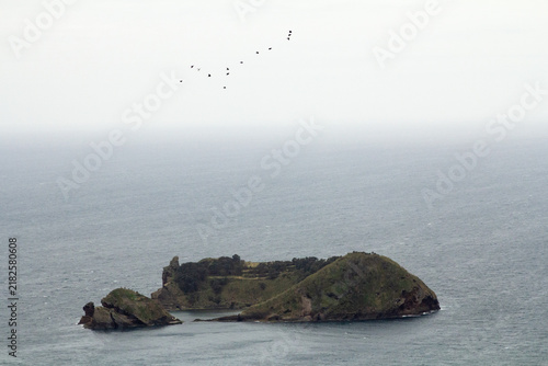 The volcanic islet of Vila Franca do Campo rises from the Atlantic Ocean off São Miguel.