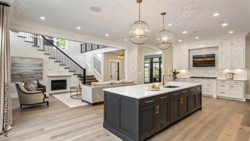 Luxury Open-Concept Kitchen and Living Room with Charcoal Island