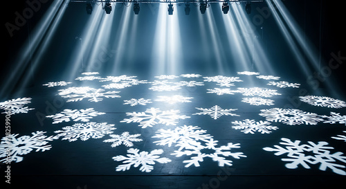Floating snowflakes in bright light beams