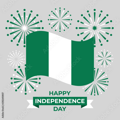 Nigerian Independence Day celebration with flag and fireworks on gray background.