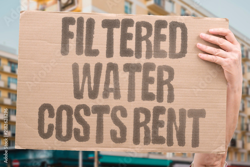 Cuadro en lienzo "Filtered water costs rent" Access pricing excludes low-income populations from safe drinking water