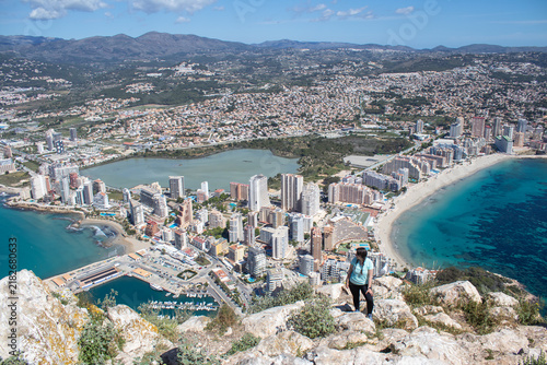 Fotografie Woman enjoying panoramic view of Calpe coastline in Spain