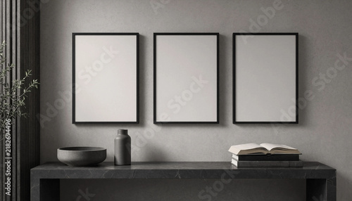 Minimalist interior design mock up with three empty picture frames hanging on the wall